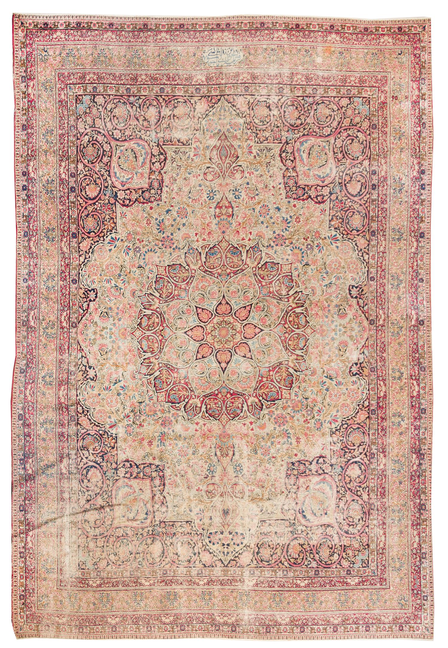 A Lavar Kirman Wool Rug 11 feet 8 inches x 8 feet 10 inches. — CIRCA 1890
