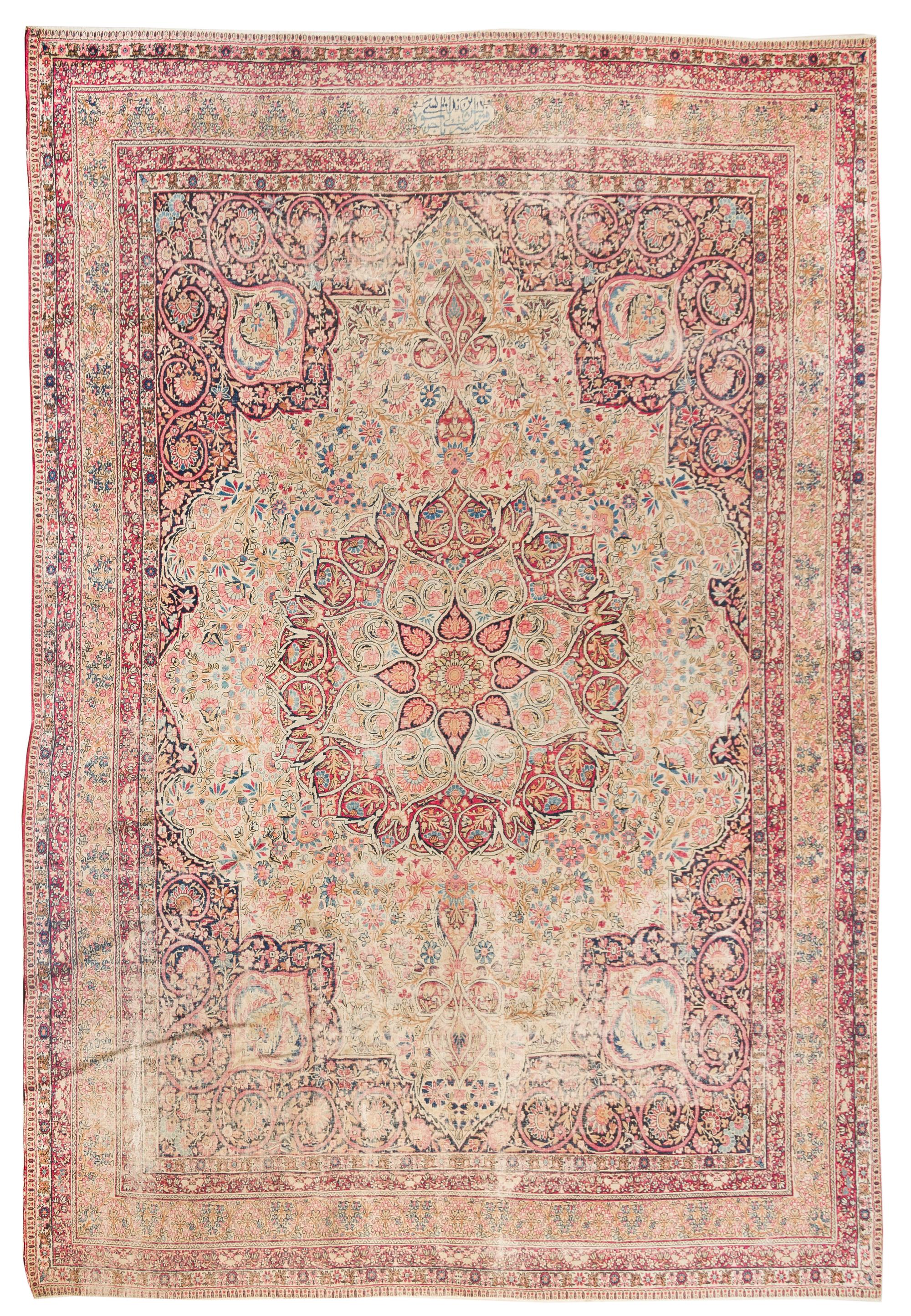 A Lavar Kirman Wool Rug 11 feet 8 inches x 8 feet 10 inches. — CIRCA 1890