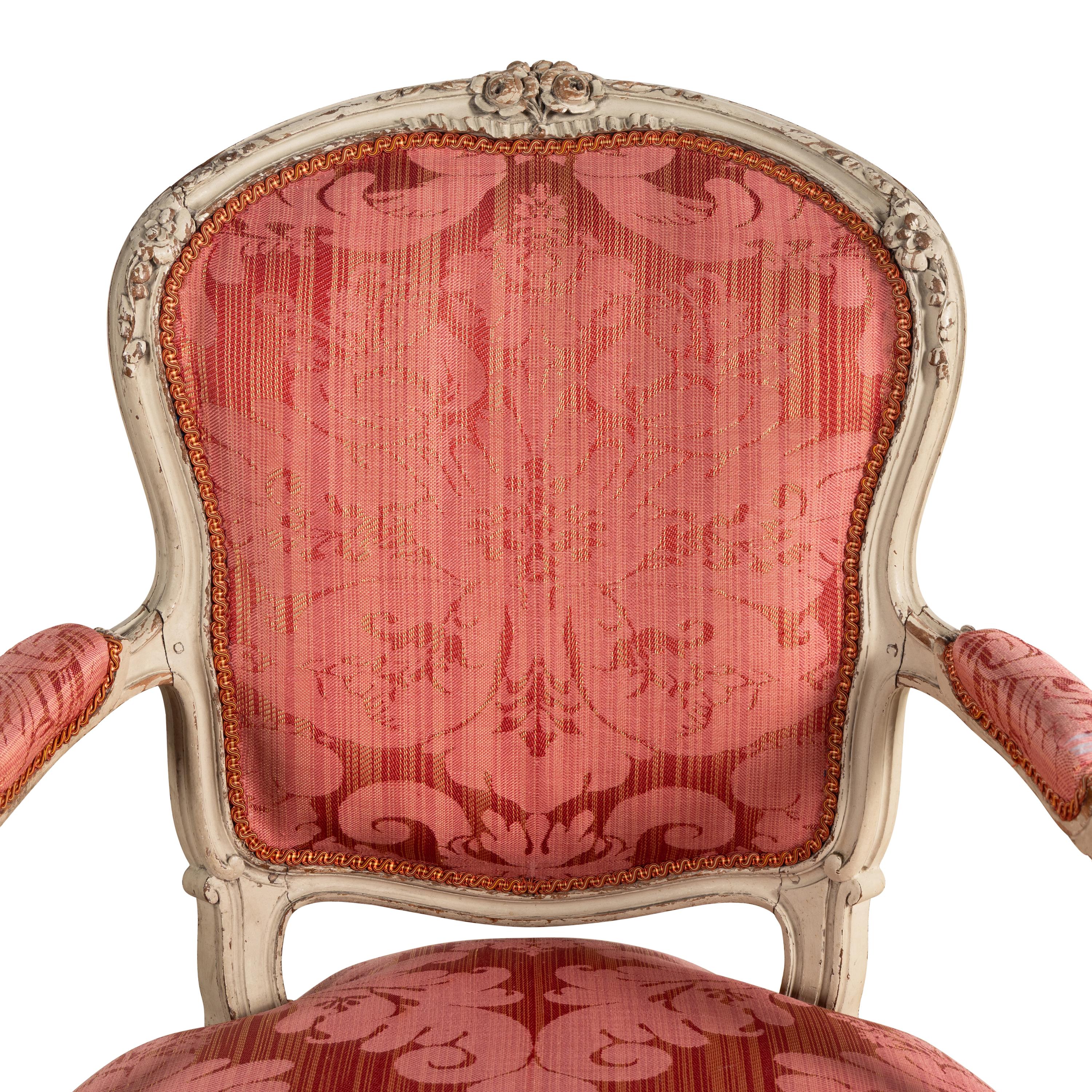 A Pair of Louis XV White-Painted Fauteuils