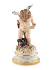 A Meissen Porcelain Putto Figure