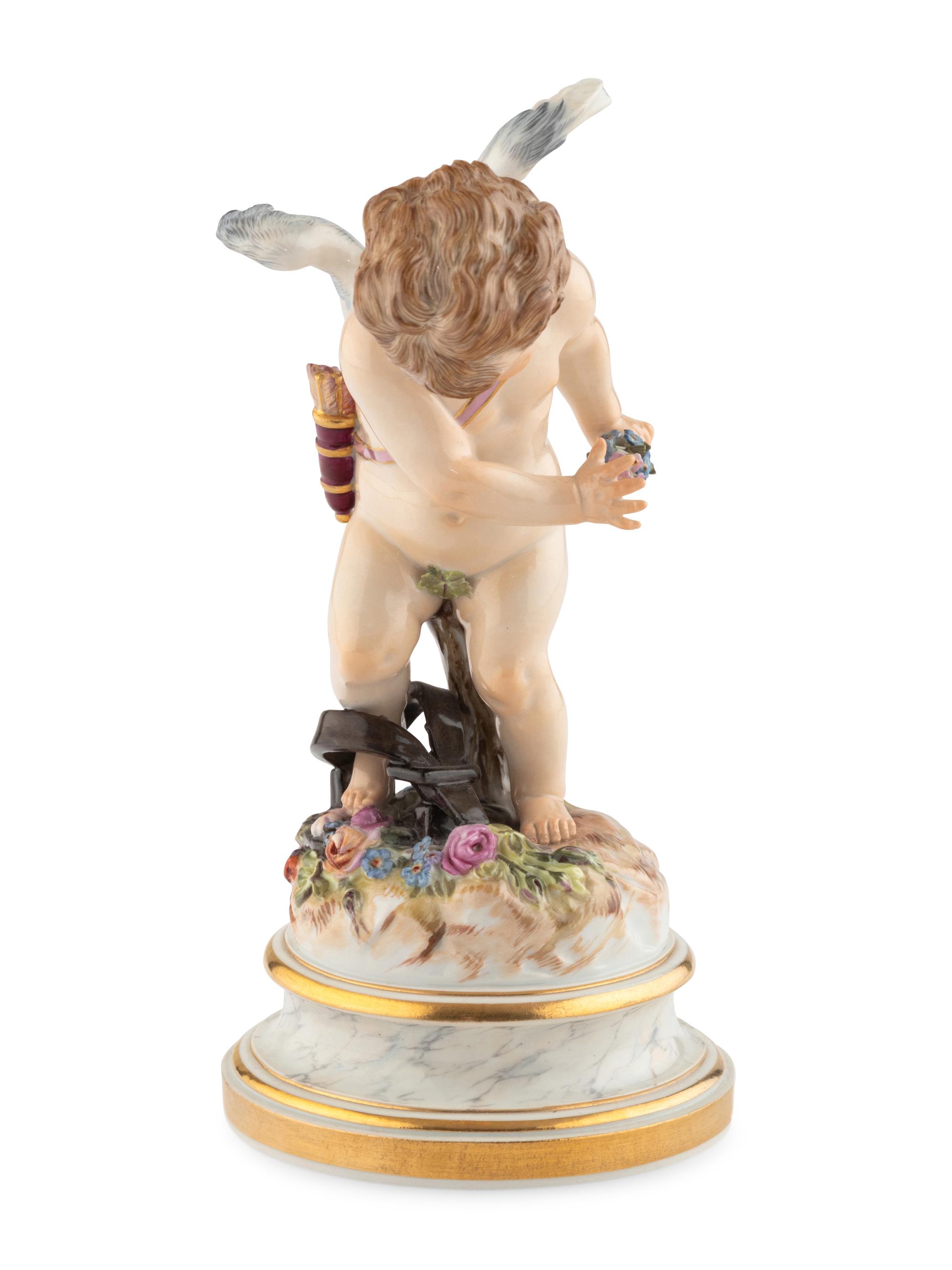 A Meissen Porcelain Putto Figure
