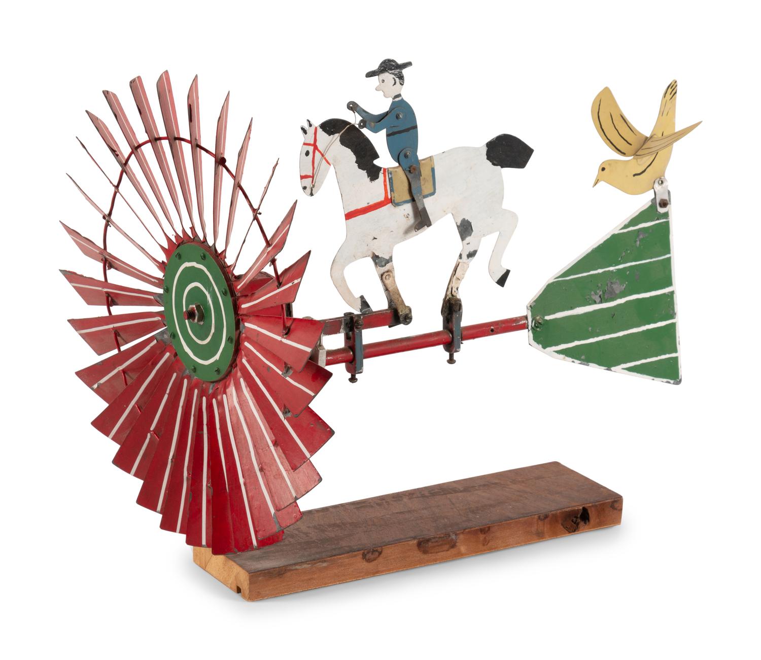 A Folk Art Painted Tin Whirligig of a Trotting Horse