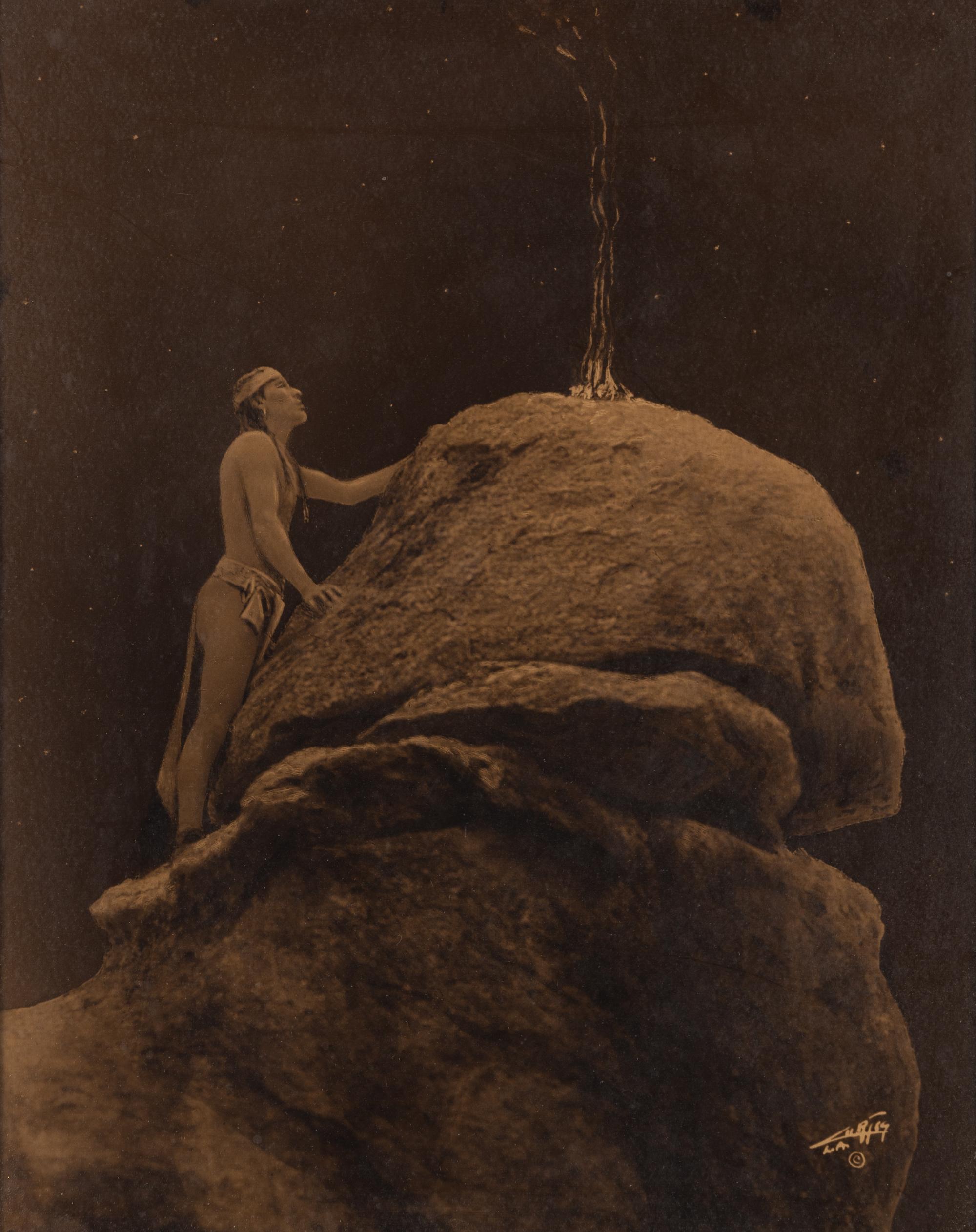 CURTIS, Edward (1868-1952), photographer. Signal Fire to the Mountain Gods. Ca 1909.