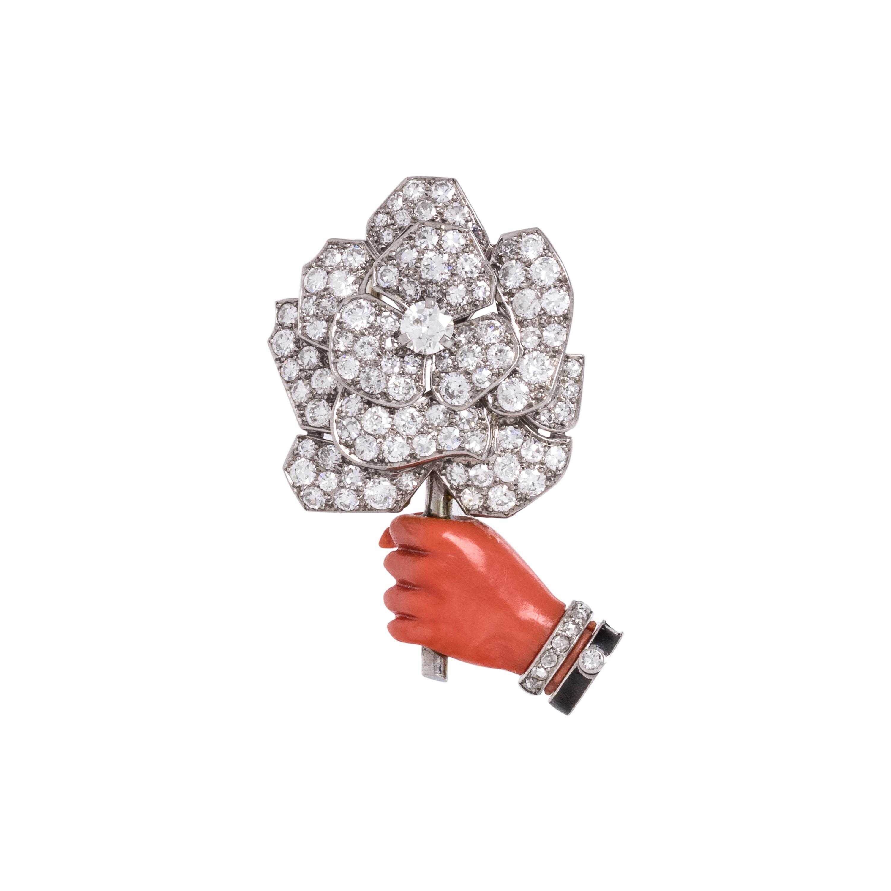 CARTIER, ART DECO, CORAL AND DIAMOND 'FLOWER IN HAND' BROOCH