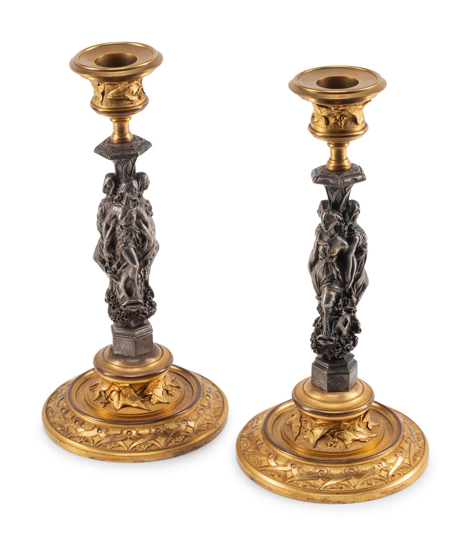 A Pair of Continental Gilt Bronze and Pewter Candlesticks