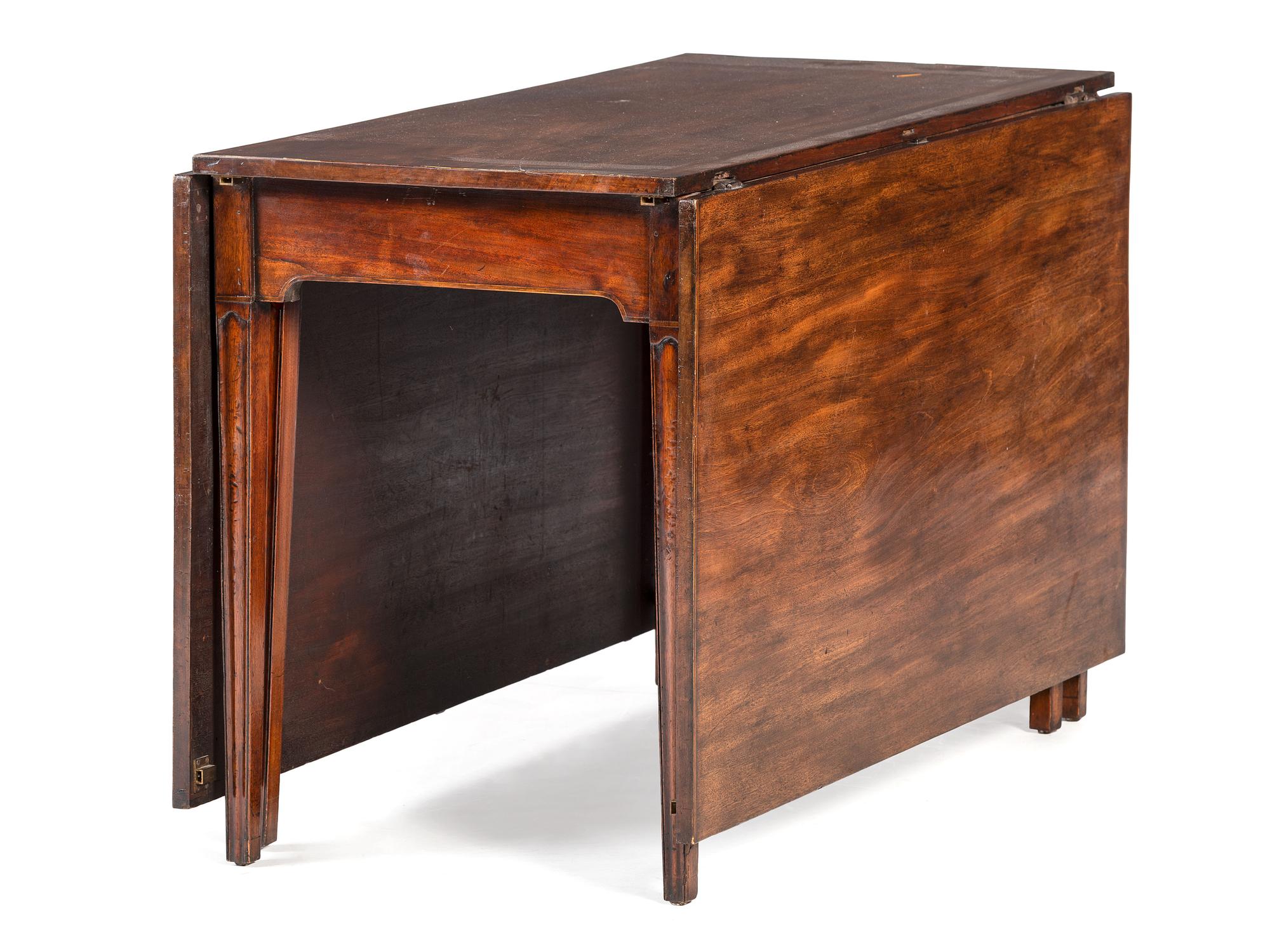 An English Mahogany Dining Table