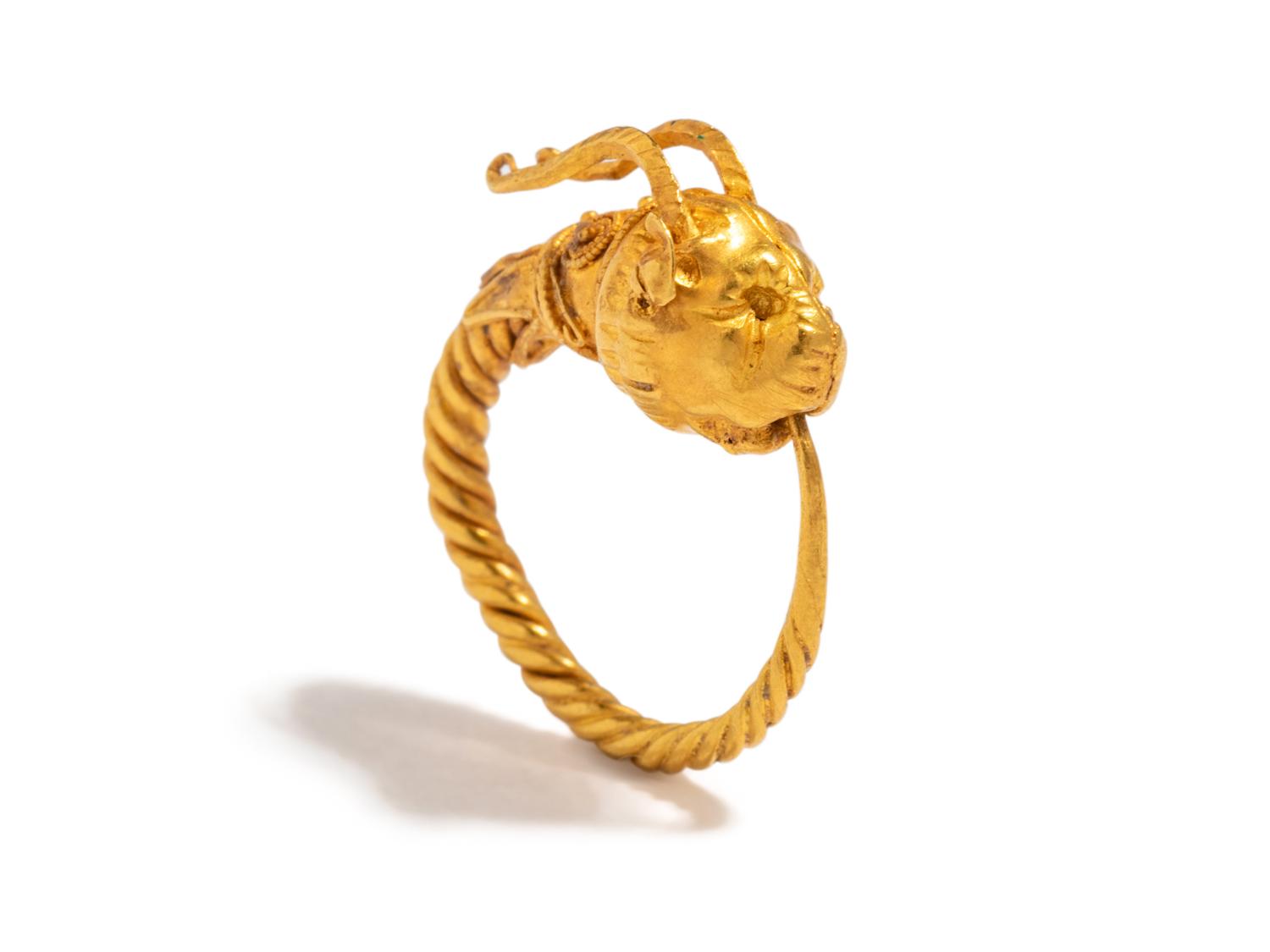 A Greek Gold Hoop Earring with a Griffin-Head Terminal