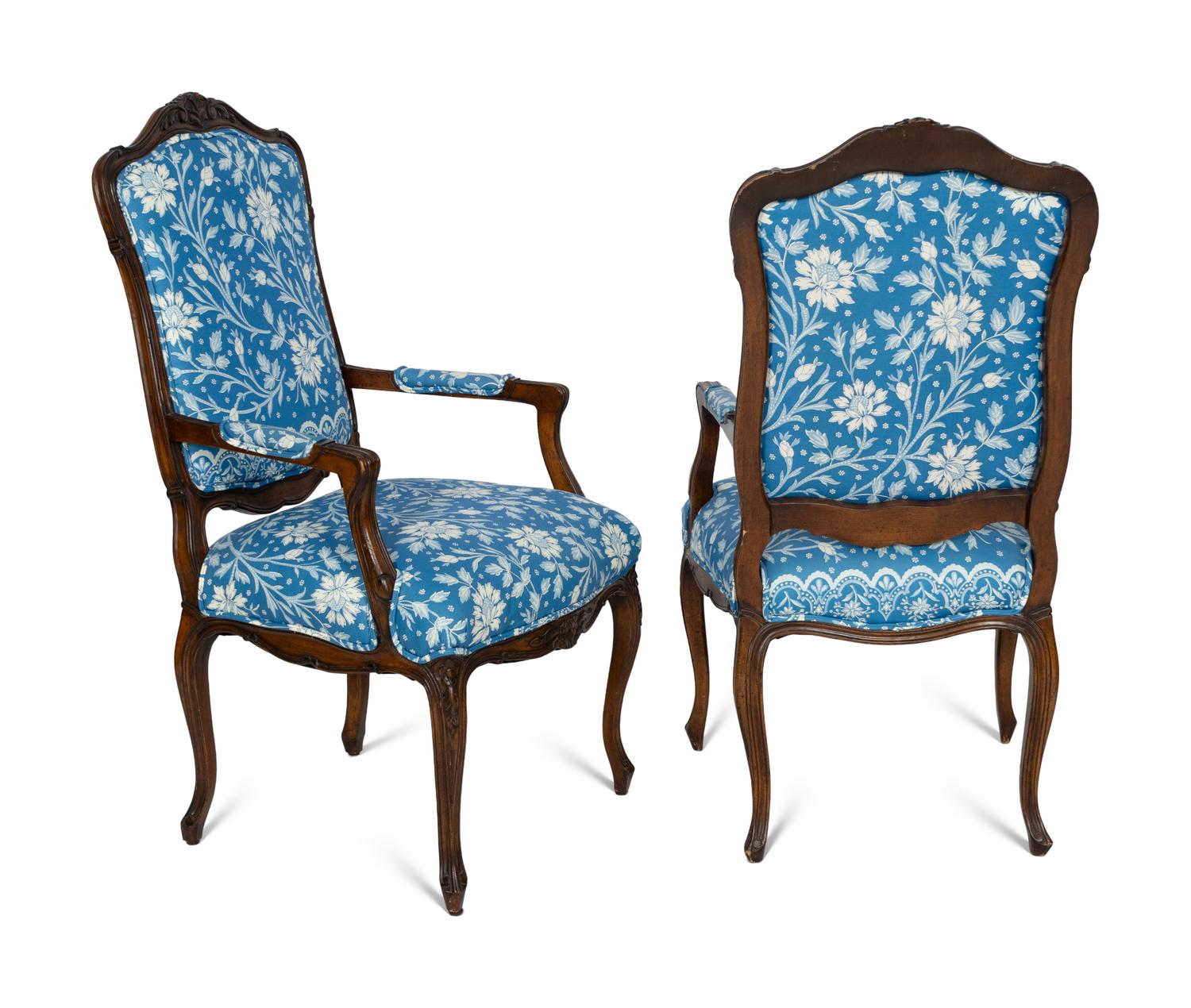 A Pair of Louis XV Style Walnut Fauteuils