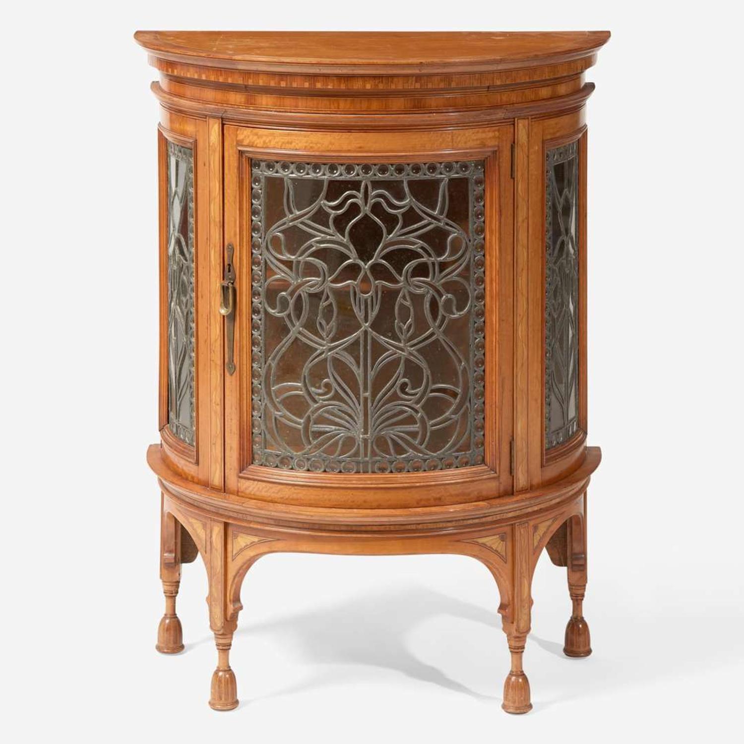 An English Aesthetic Movement inlaid satinwood and harewood demilune cabinet circa 1895