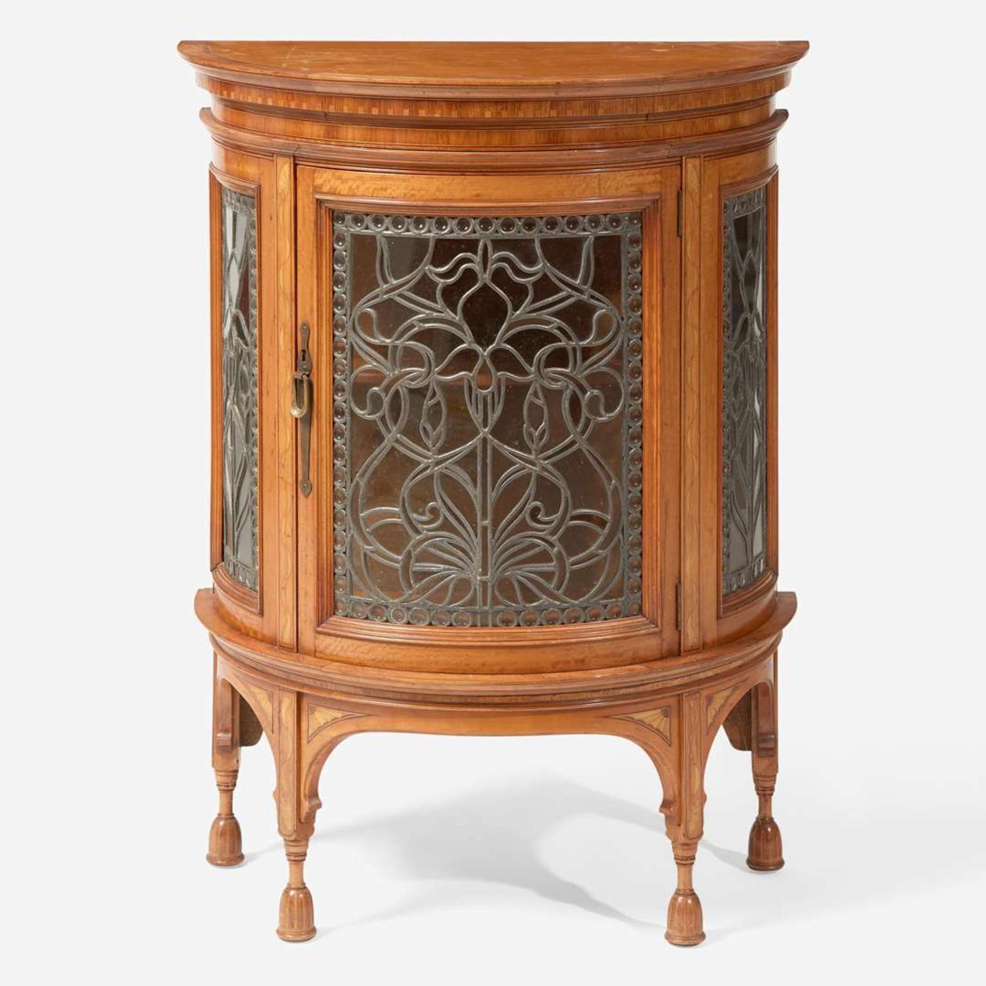 An English Aesthetic Movement inlaid satinwood and harewood demilune cabinet circa 1895