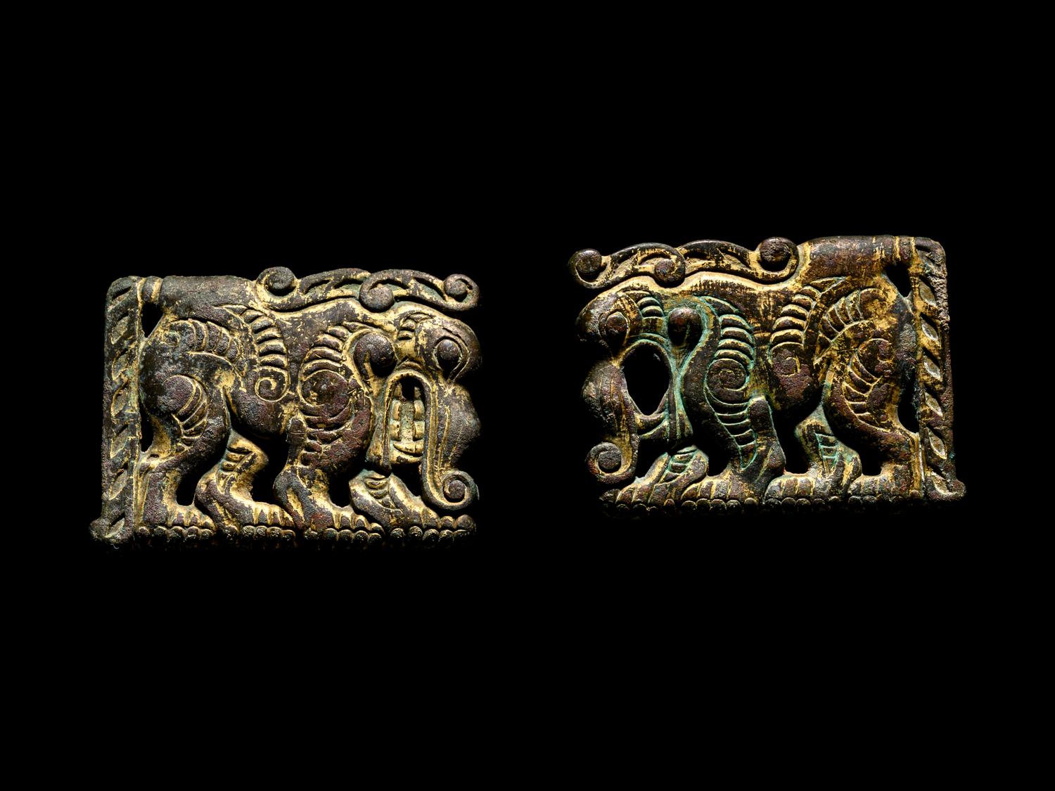 A Pair of Ordos Bronze Plaques of Mythological Beasts