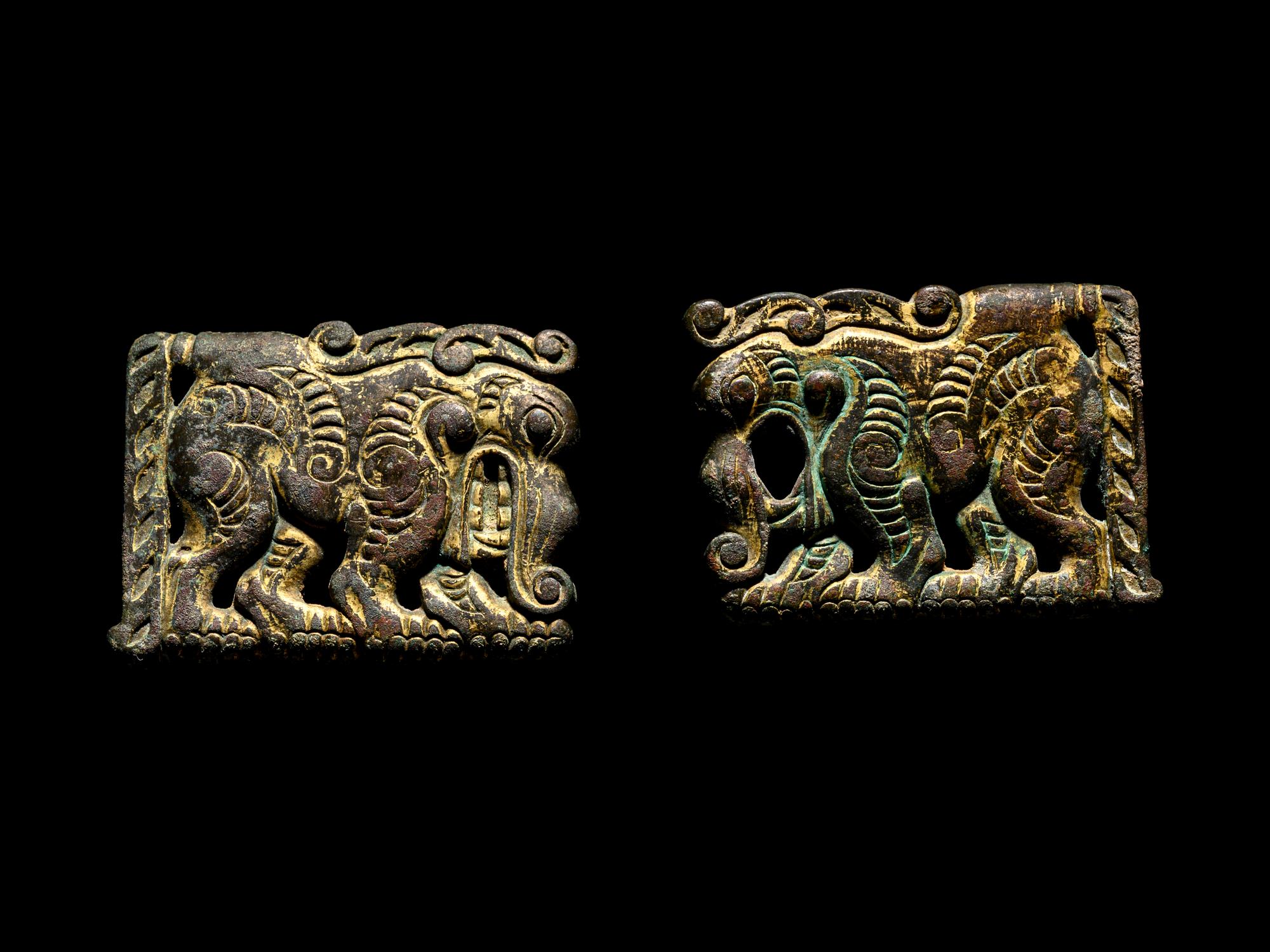 A Pair of Ordos Bronze Plaques of Mythological Beasts