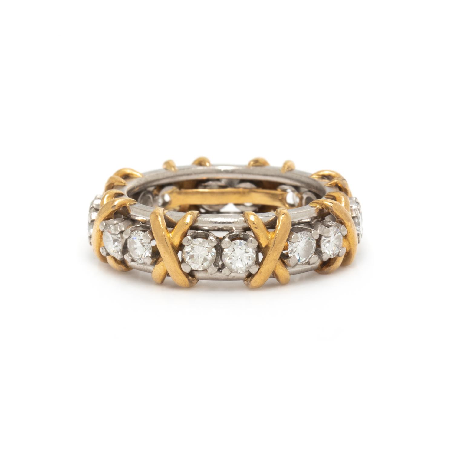 TIFFANY & CO., SCHLUMBERGER, YELLOW GOLD, PLATINUM, AND DIAMOND 'SIXTEEN STONE' RING