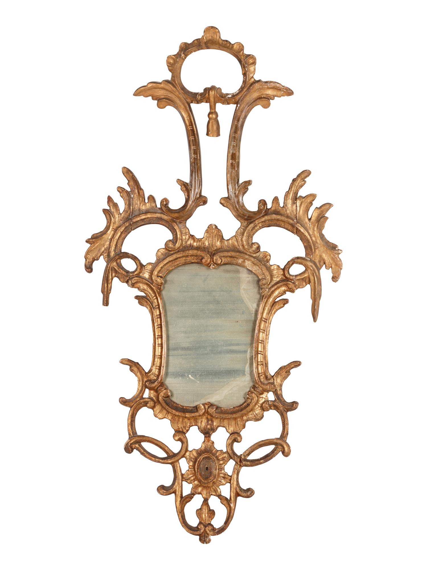 An Italian Baroque Style Giltwood Mirror