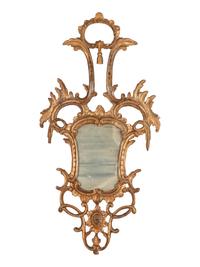 An Italian Baroque Style Giltwood Mirror