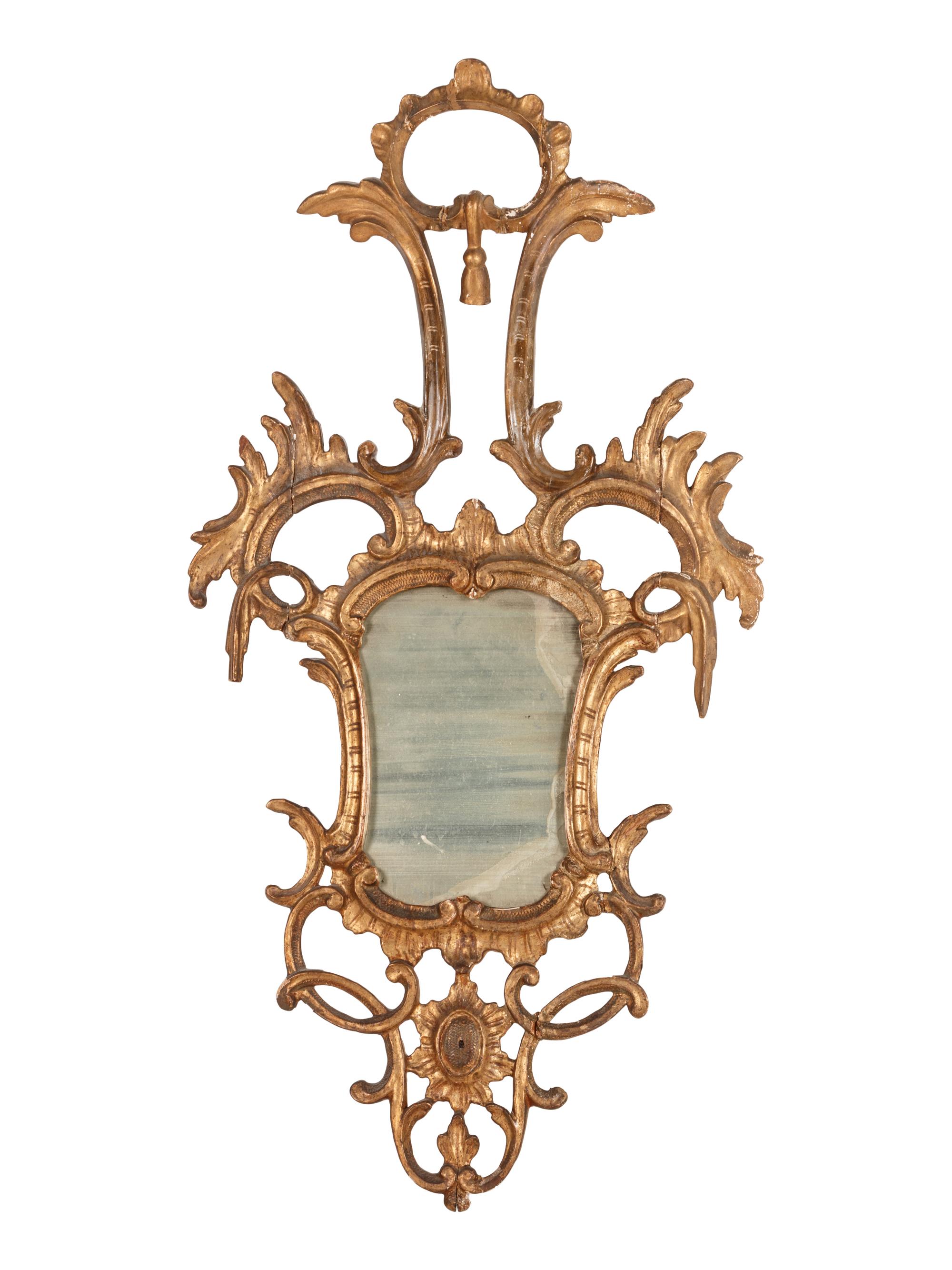 An Italian Baroque Style Giltwood Mirror