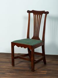 A Set of Six Chippendale Volute-Carved Mahogany Side Chairs