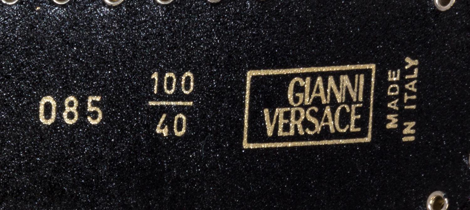 A Gianni Versace Red Leather Belt, Size 100/40.