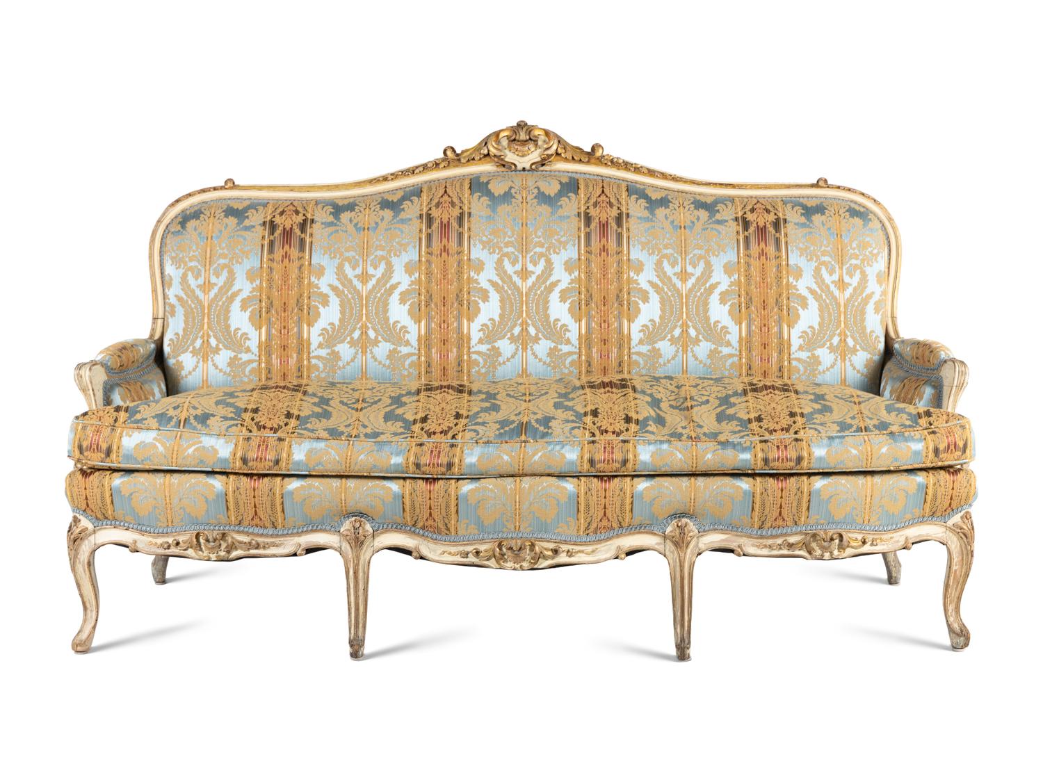 A Louis XV Style Cream Painted and Parcel Gilt Canapé