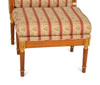 A Pair of Louis XVI Style Bergeres with Matching Ottomans