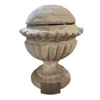 A Carved Limestone Finial from the Second Chicago Courthouse 44" W x 44" D x 53" H — United States, Circa 1935