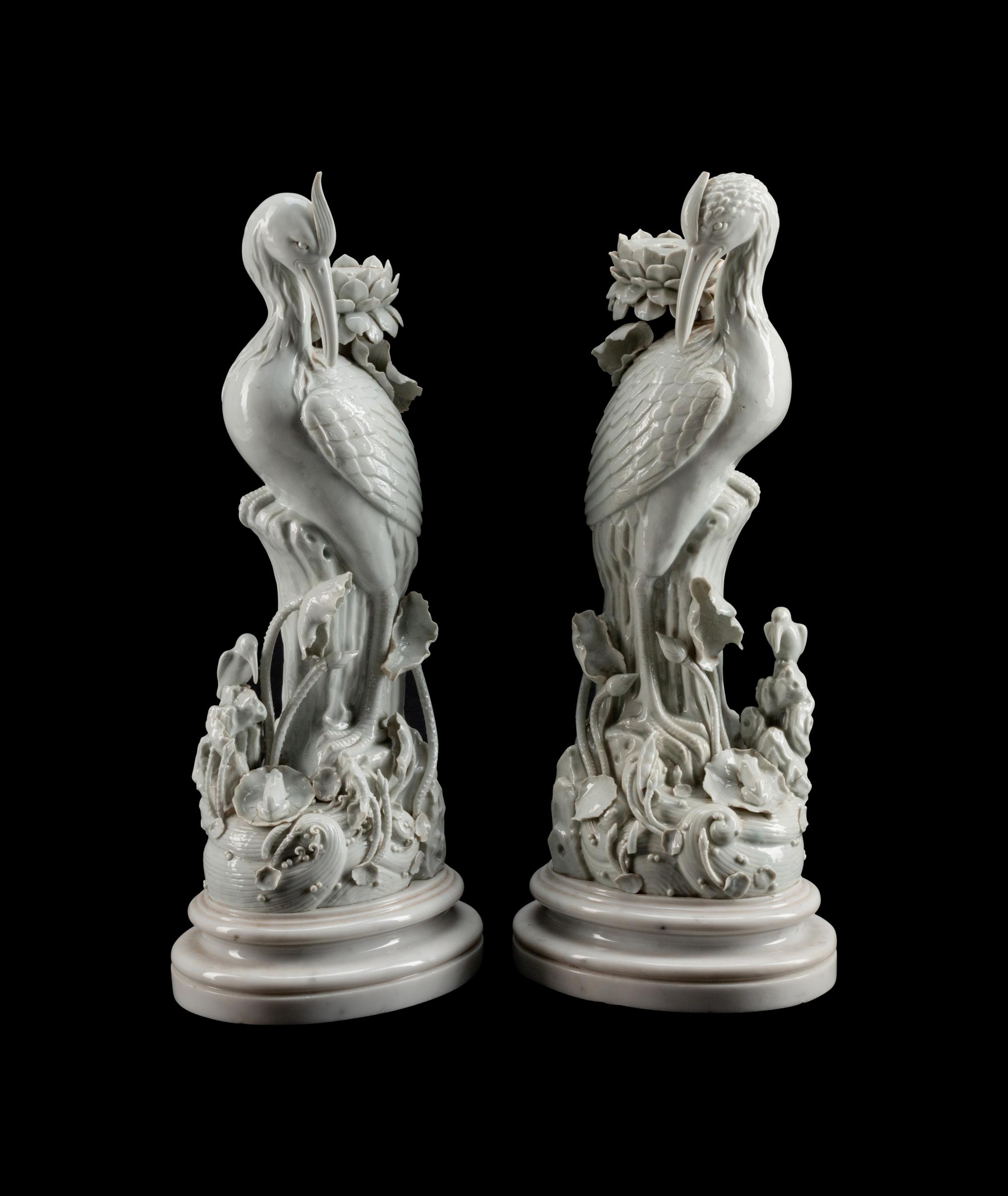 A Pair of Chinese Blanc de Chine Porcelain Crane-Form Candlesticks