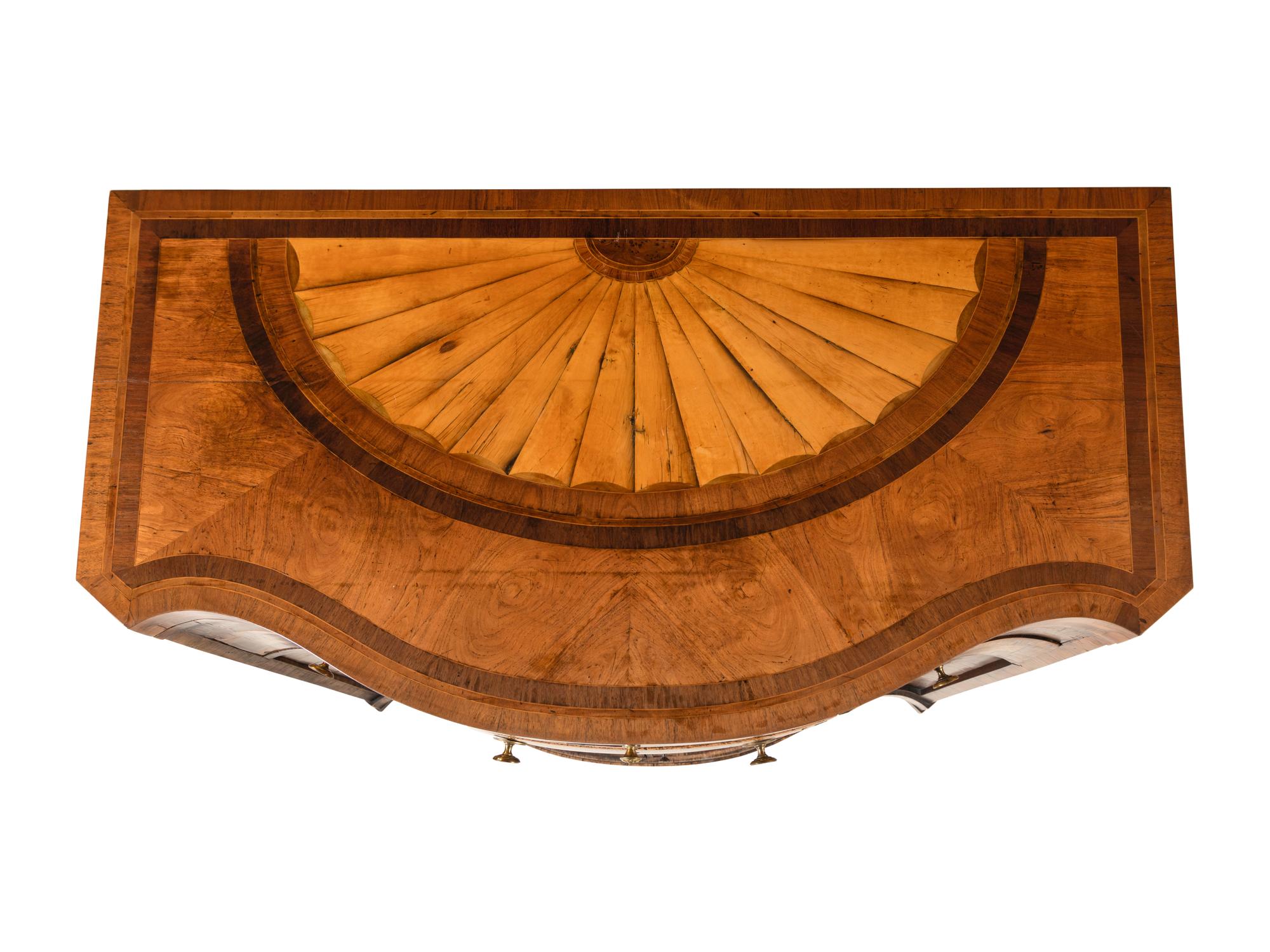 An Anglo-Dutch Tulipwood, Rosewood, Mahogany and Burr Elm Serpentine Klapbuffet
