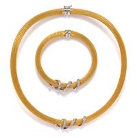 An 18 Karat Bicolor Gold and Diamond Demi Parure, 65.50 dwts.