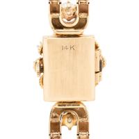 TOURNEAU, YELLOW GOLD, DIAMOND, SAPPHIRE AND CULTURED PEARL SURPRISE WATCH