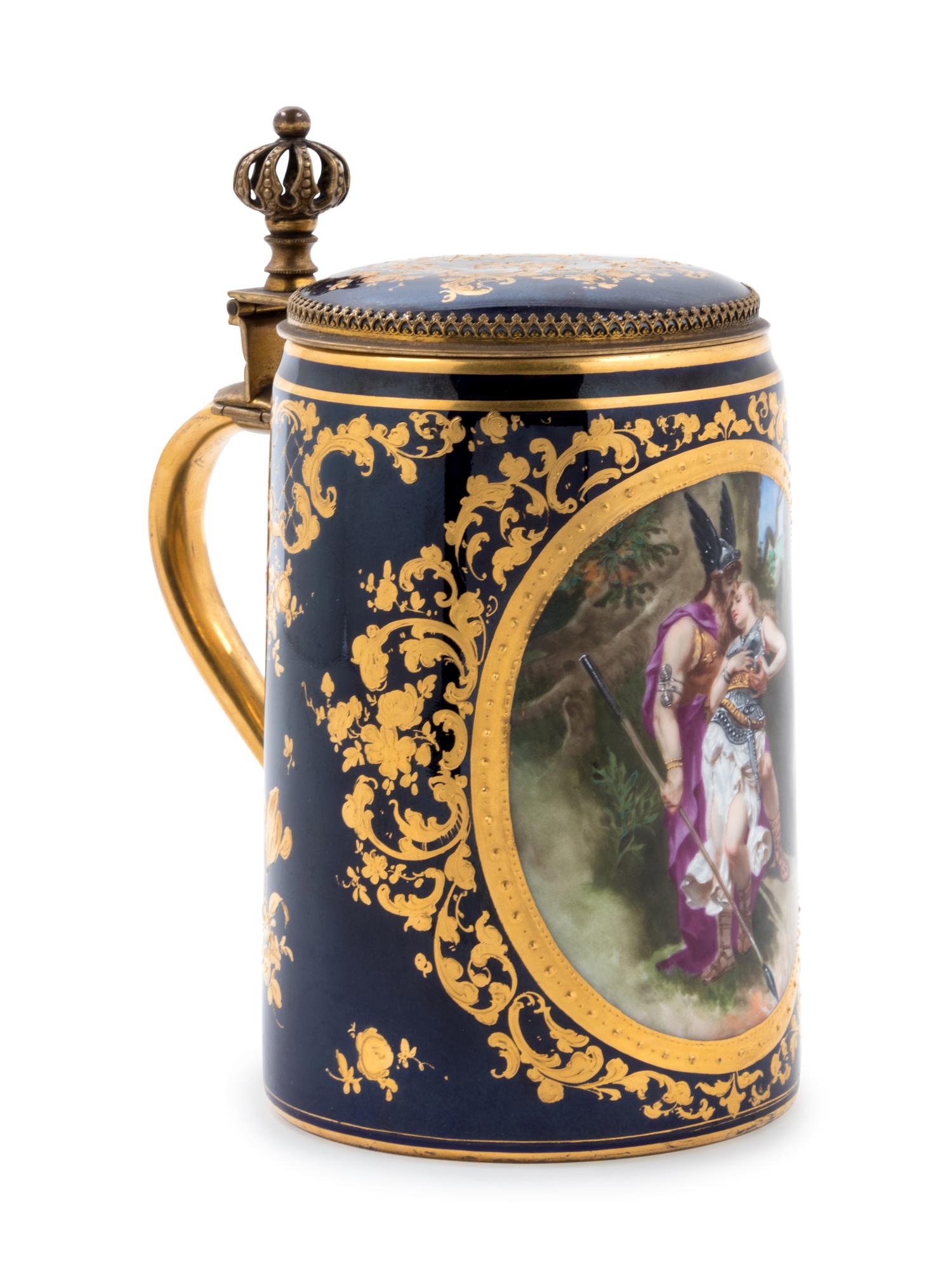 A Vienna Style Painted and Parcel Gilt Porcelain Tankard