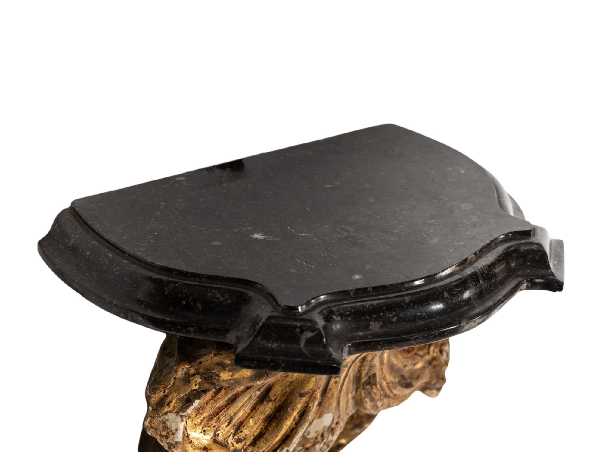 A Pair of Continental Giltwood Marble-Top Brackets