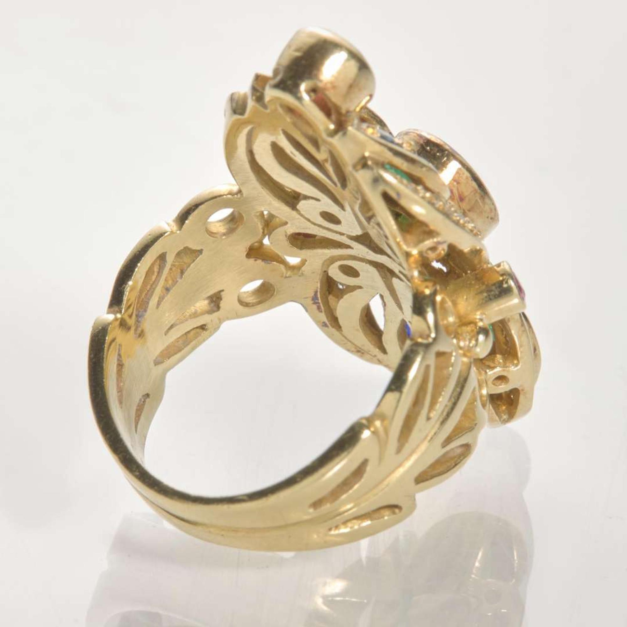 An 18K Yellow Gold and Gemstone Ring