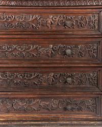 A Baroque Highly Carved Walnut Commode