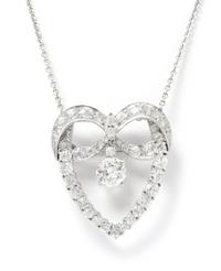 A Vintage Platinum and Diamond Bow Pendant, 8.40 dwts.