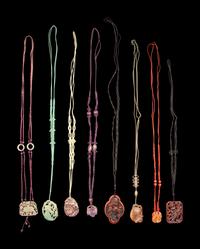Eight Chinese Hardstone and Lacquer Pendants