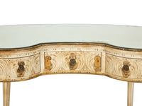 A Louis XVI Style Painted Reniform Dressing Table