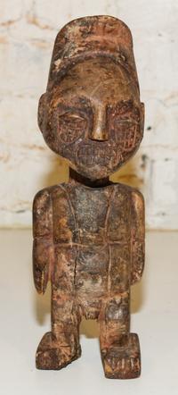 A Carved Wood Figure. Height 11 1/2 inches.