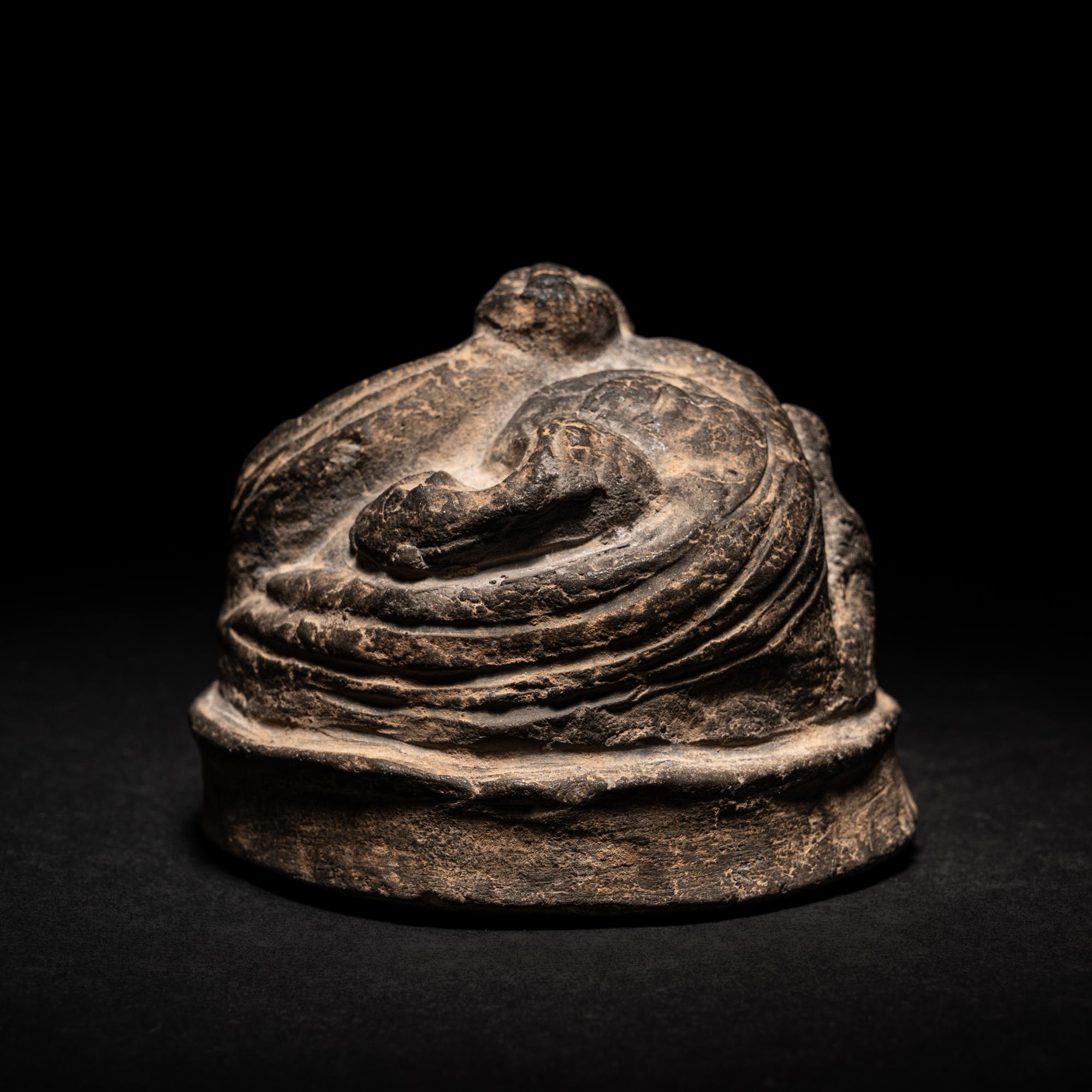 A Chinese Grey Pottery Weight