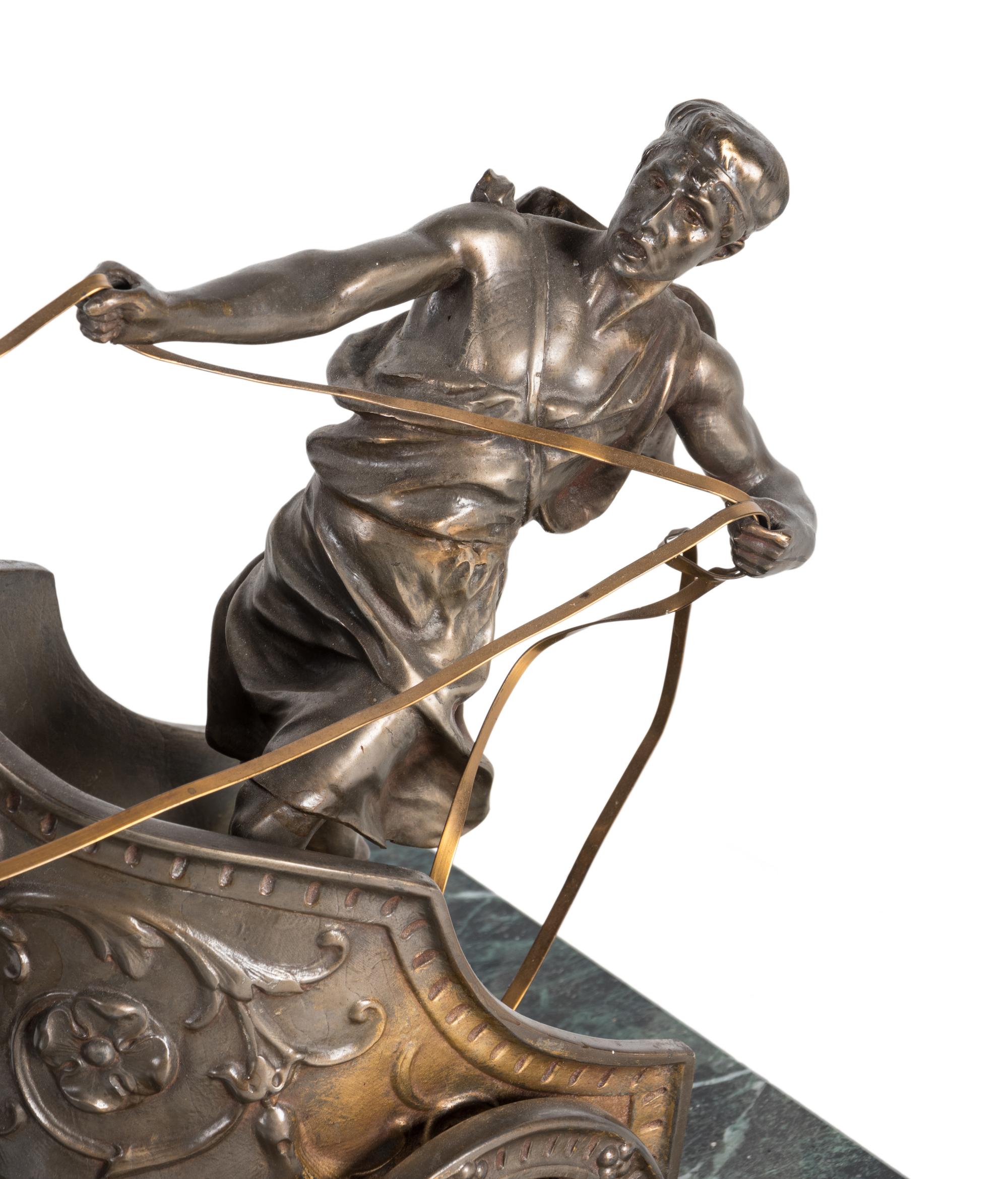A Bronze and Patinated Metal Figural Group Depicting a Two-Horse Roman Chariot and Rider
