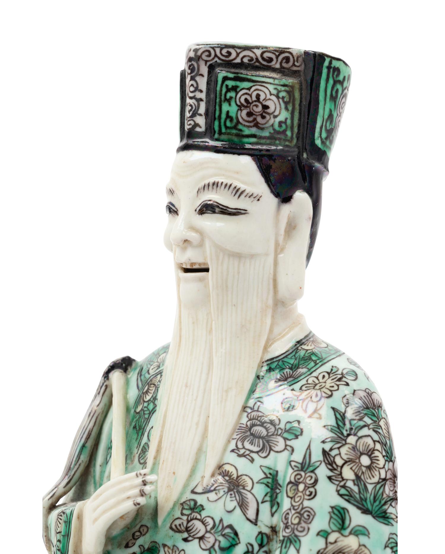 A Chinese Famille Verte Porcelain Figure of an Immortal