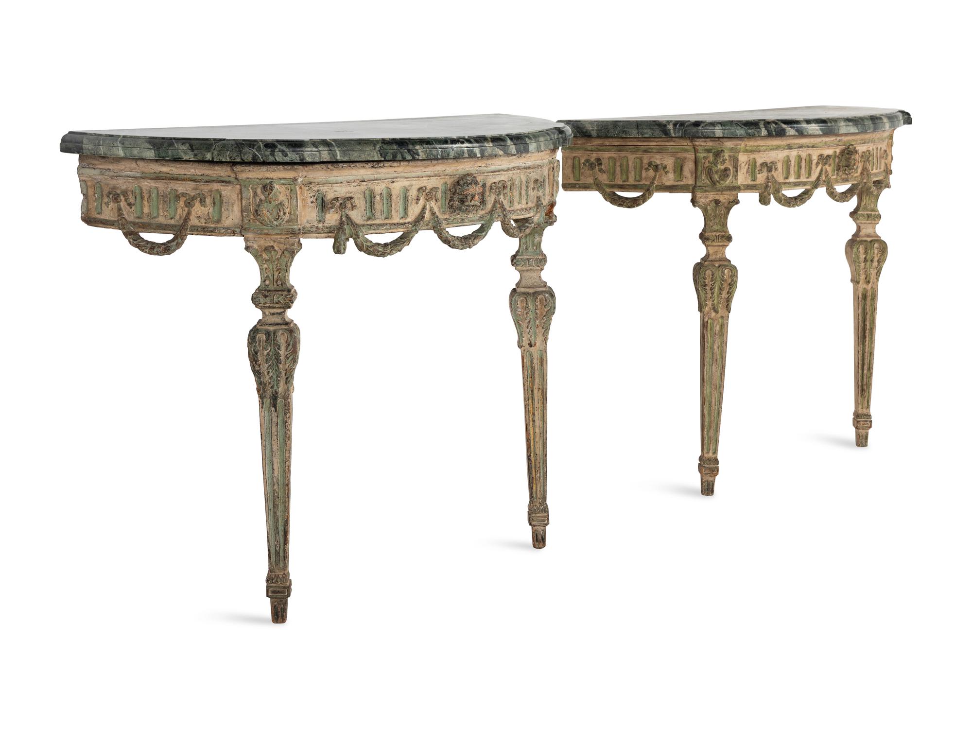 A Pair of Italian Neoclassical White and Green Painted Faux Marble-Top Demilune Console Tables