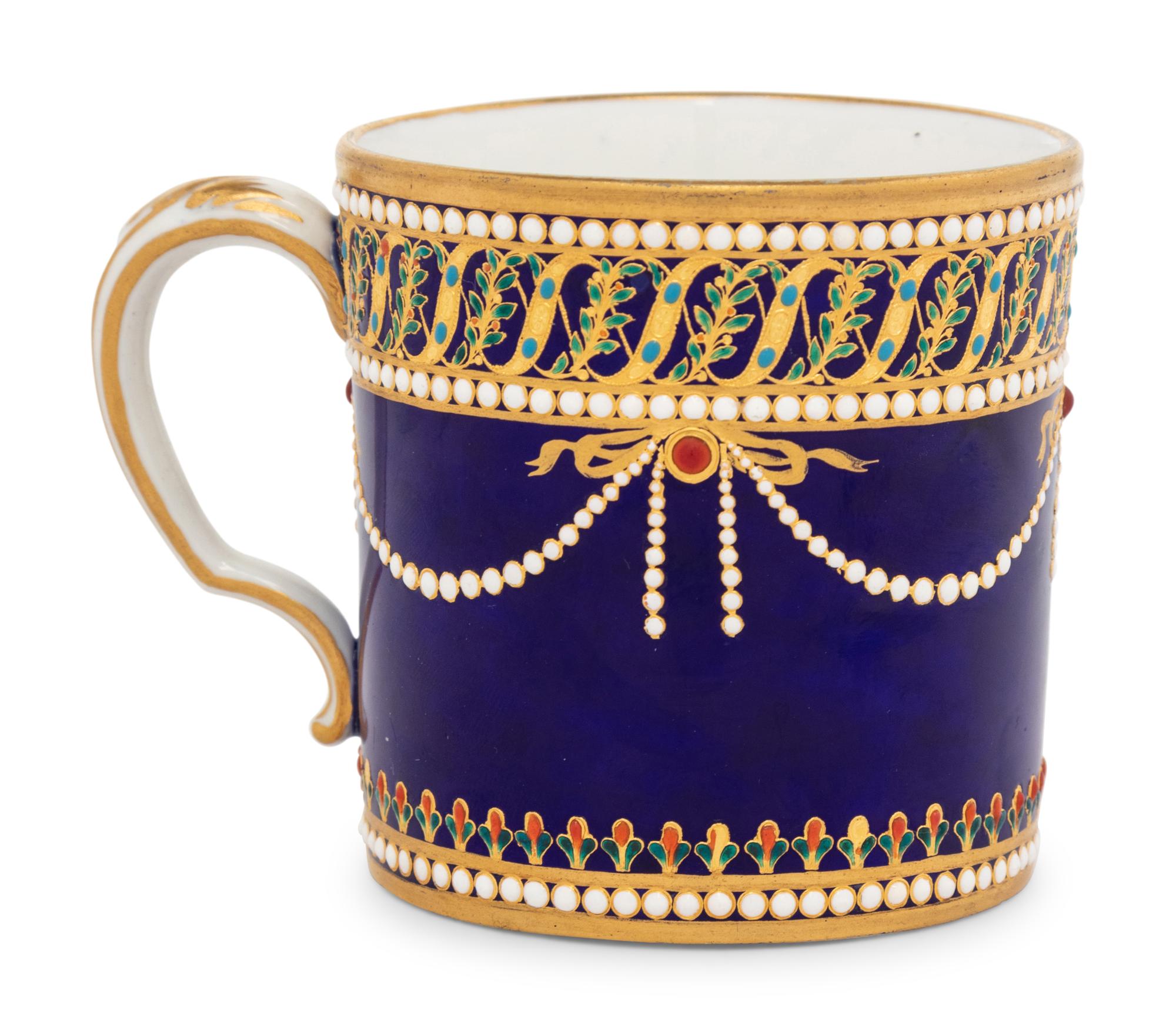 A Sèvres Partially Beau Bleu Jewelled Porcelain Coffee Can and Saucer ( Gobelet 'Litron' et sa Soucoupe, 1ère Grandeur )