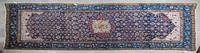 A Tabriz Wool Runner 15 feet 9 inches x 6 feet 11 inches.