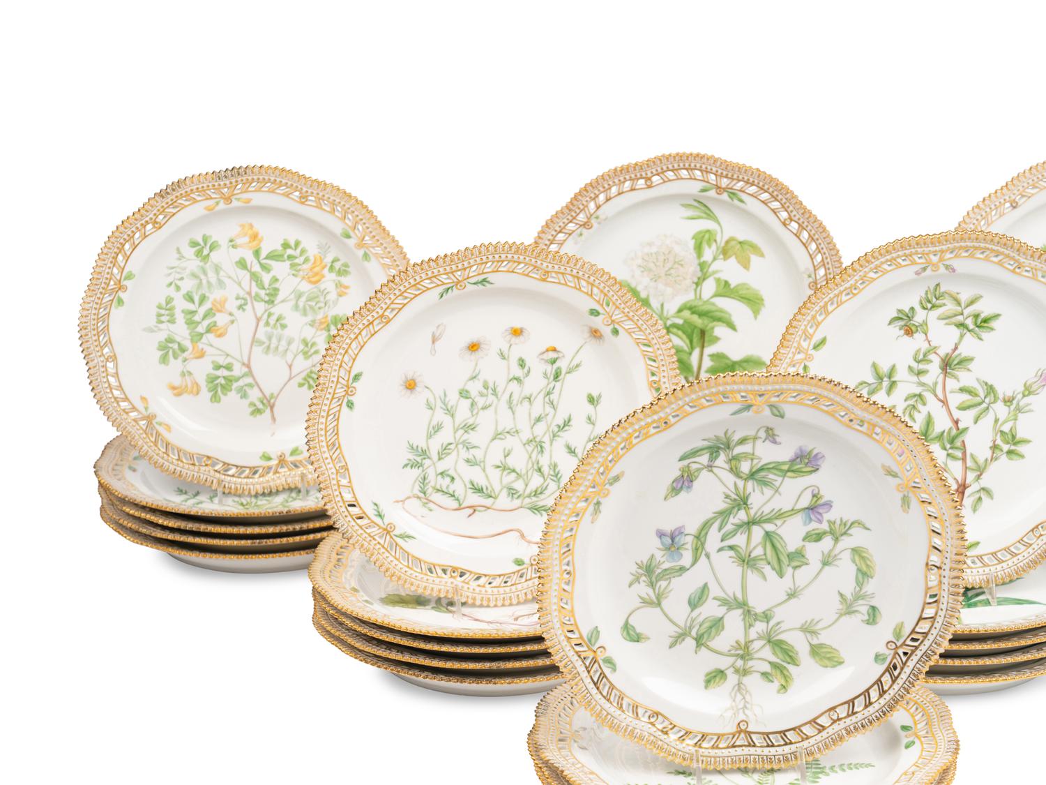 A Set of Twenty-Nine Royal Copenhagen Flora Danica Reticulated Porcelain Dinner Plates