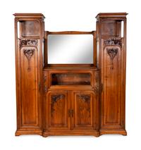 An Art Nouveau Carved Walnut Cabinet — FRENCH, EARLY 20TH CENTURY