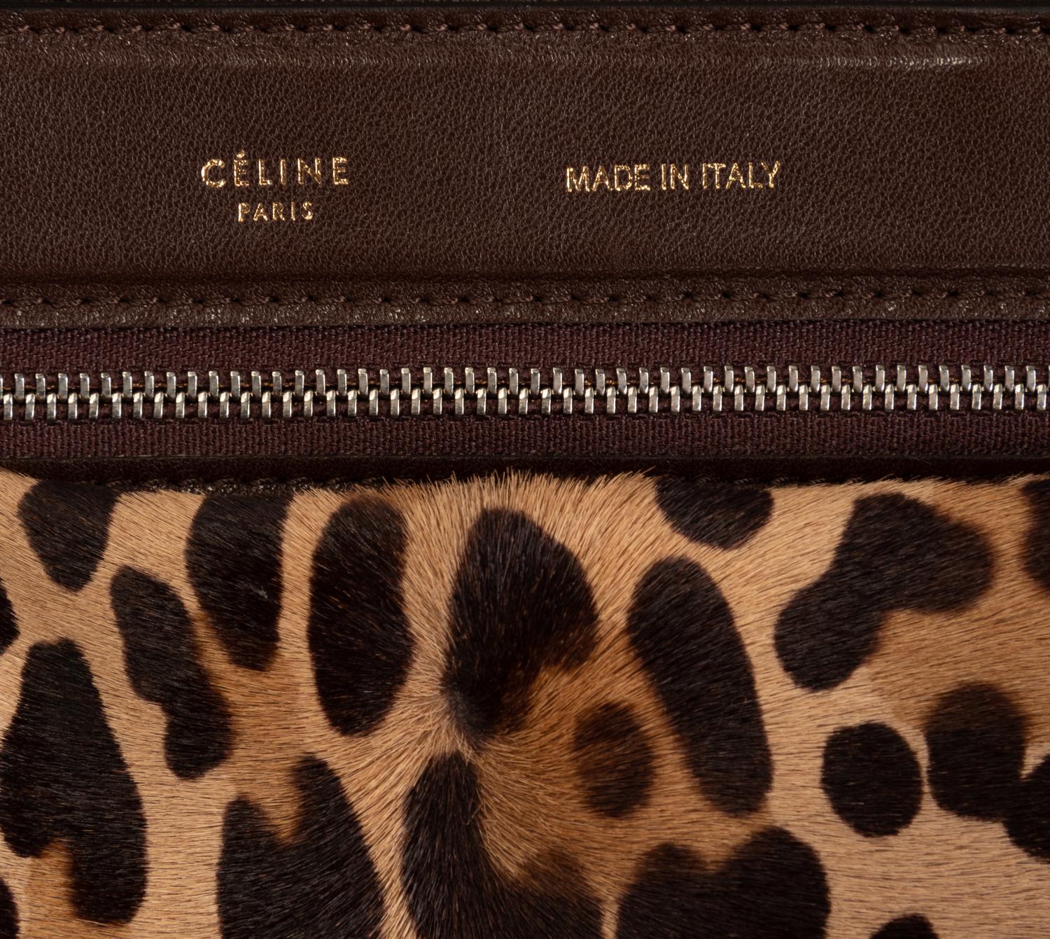 Two Designer Pony Hair Bags: One Céline Leopard Print Tote and One Prada Animal Print Clutch