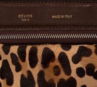 Two Designer Pony Hair Bags: One Céline Leopard Print Tote and One Prada Animal Print Clutch