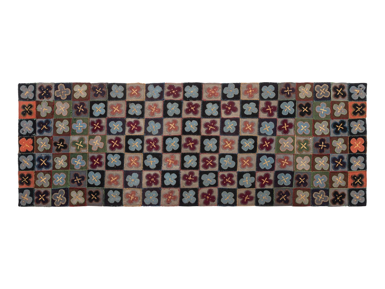 A Folk Art Felted Wool Penny Mat