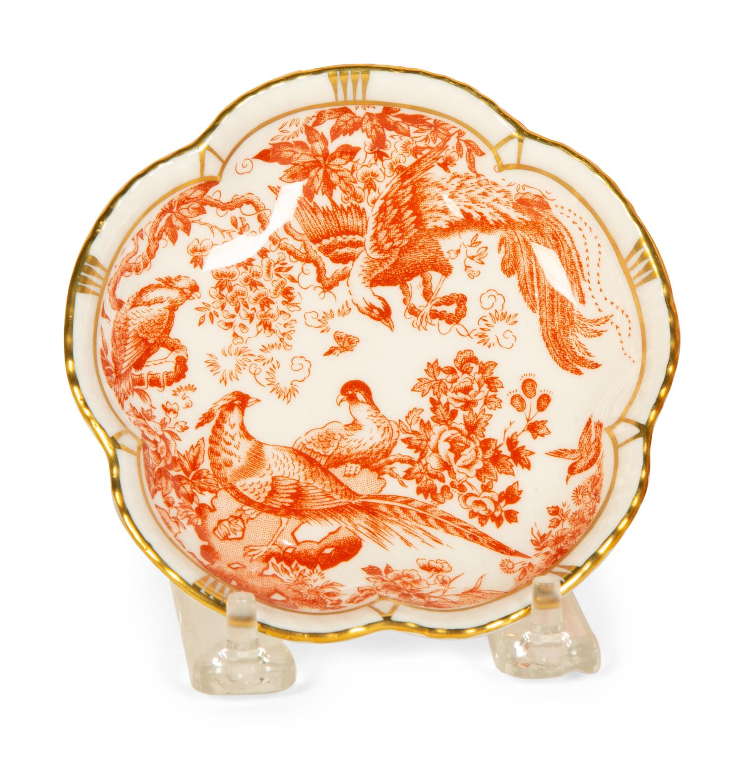 A Royal Crown Derby Red Aves Porcelain Dinner Service
