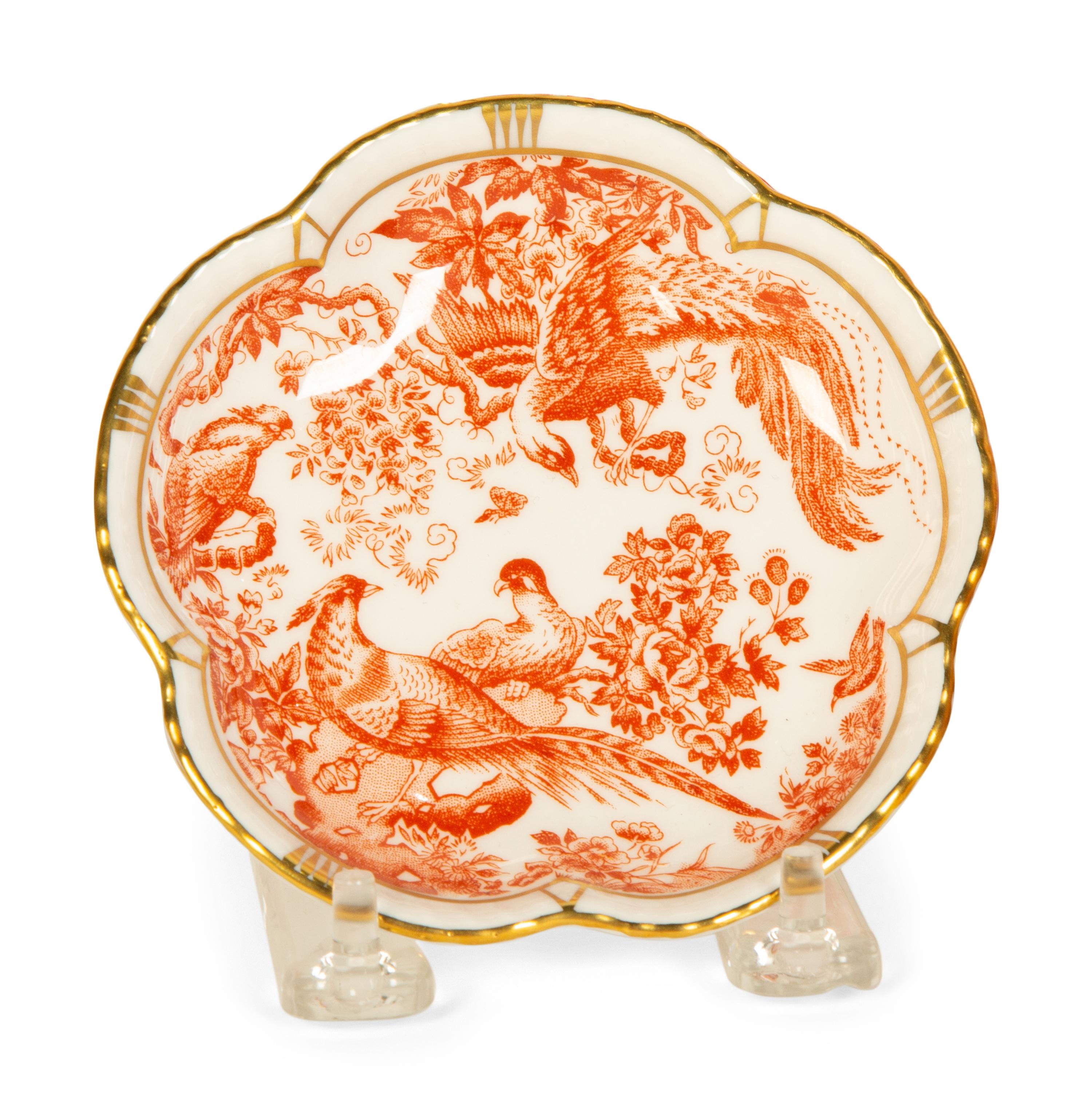 A Royal Crown Derby Red Aves Porcelain Dinner Service